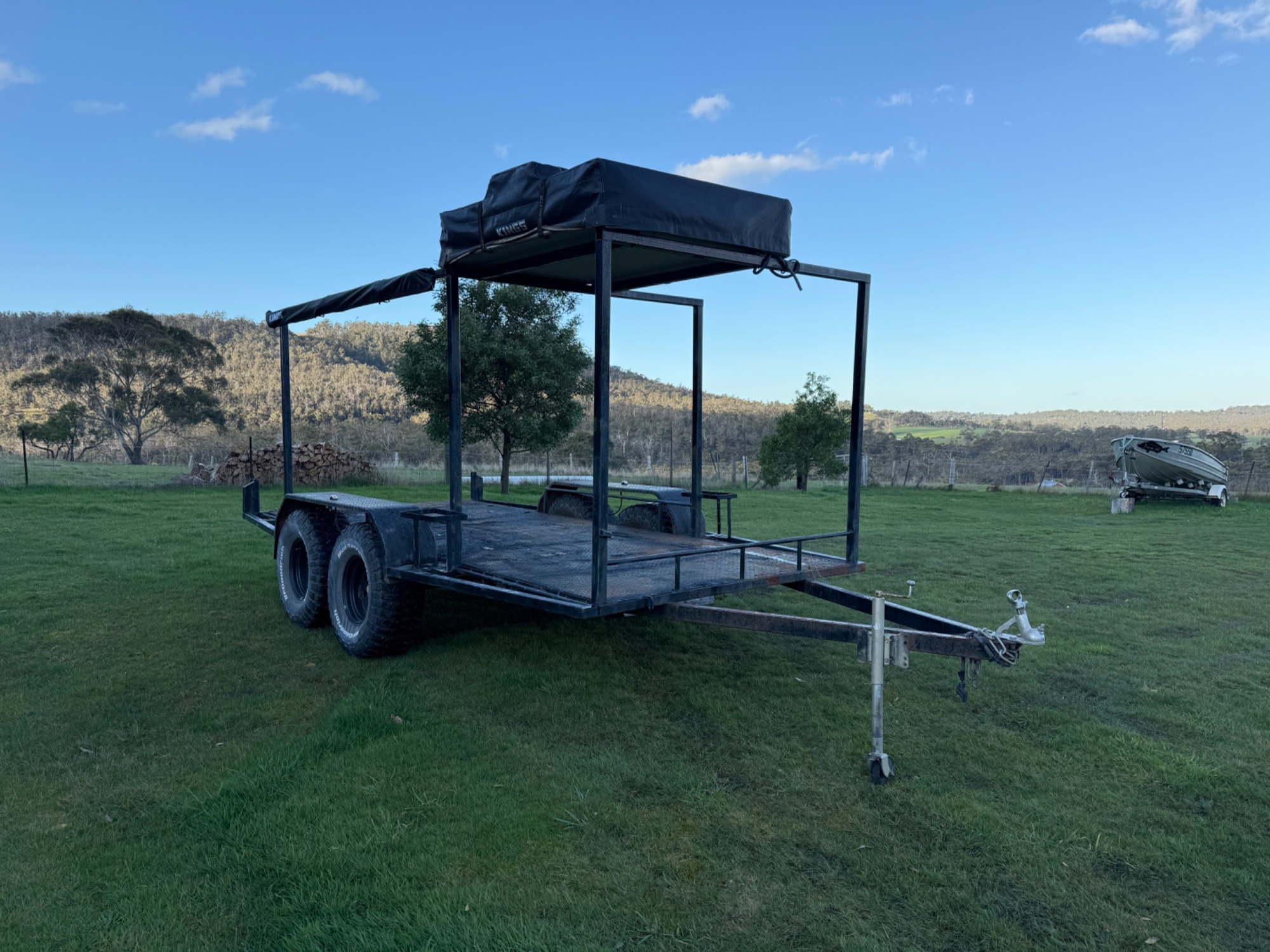 2009 Flatbed tandem trailer with kings rooftop tent,awning,Jerry can holder Custom black