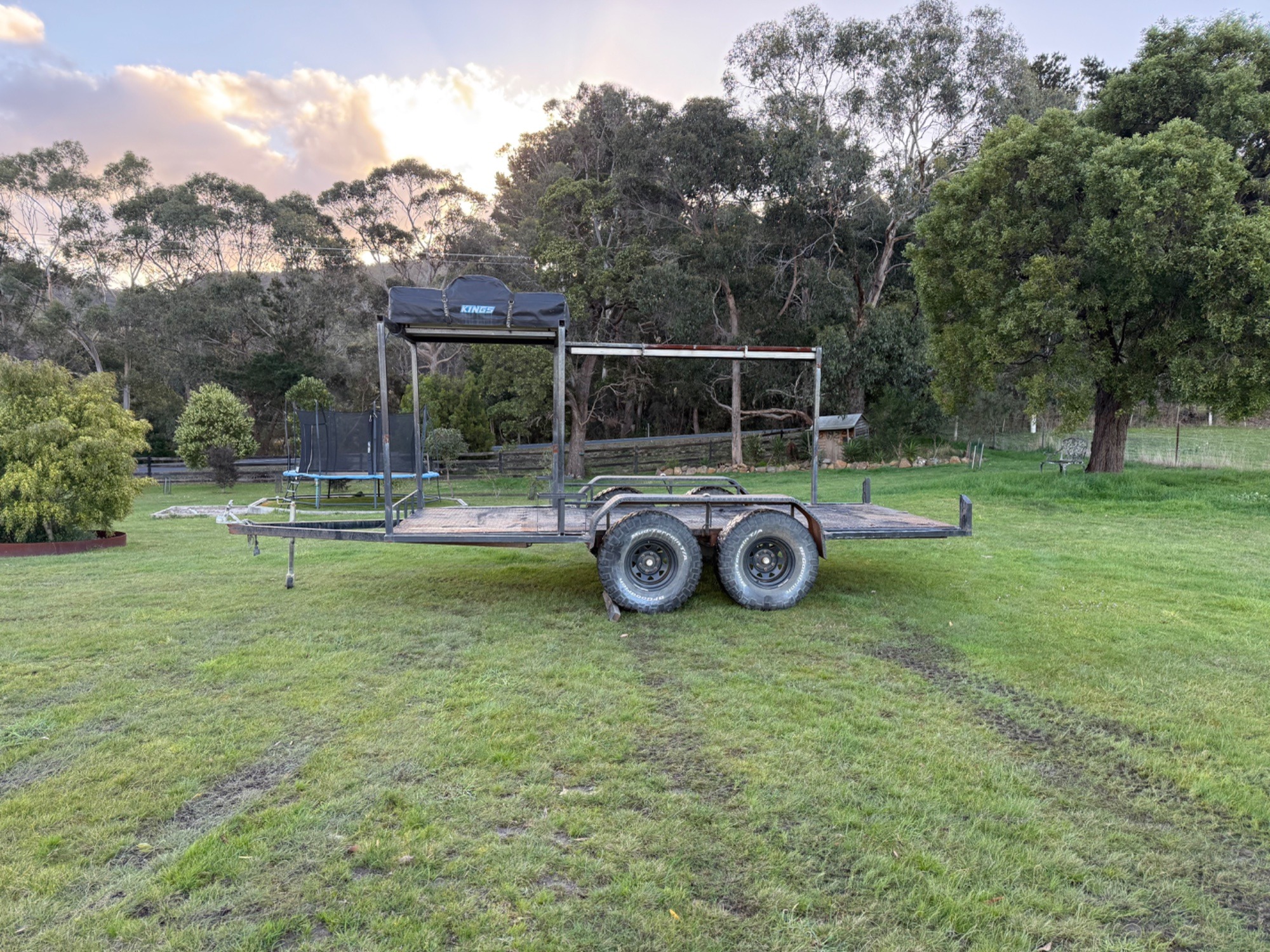 2009 Flatbed tandem trailer with kings rooftop tent,awning,Jerry can holder Custom black